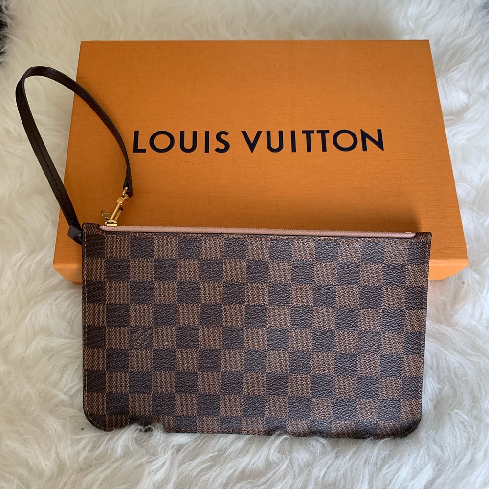 Authentic Louis Vuitton never full pouch